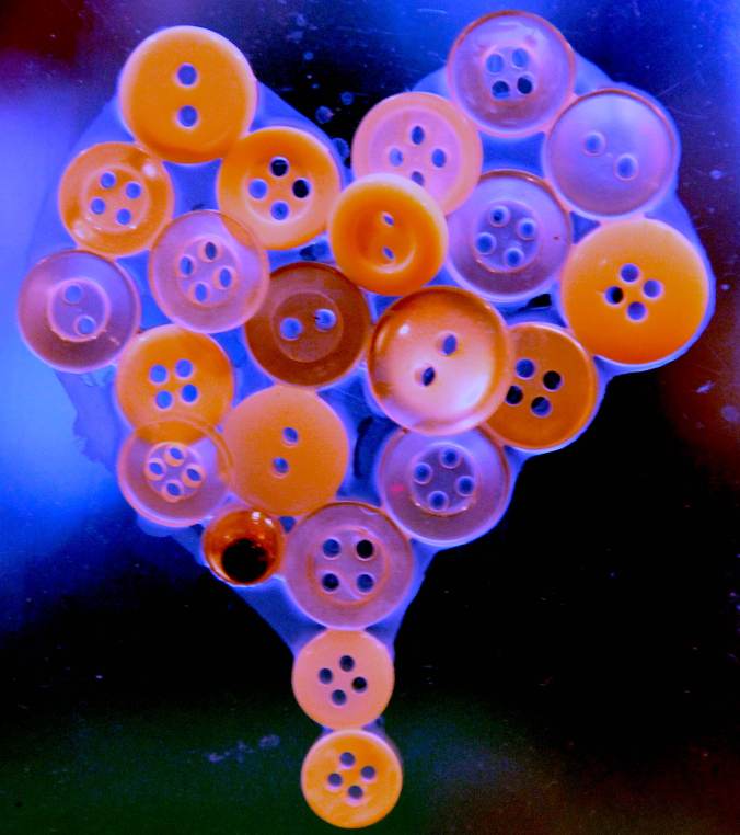 buttonvalentine1 Buttons on clear plastic retrieved from trash = valentine